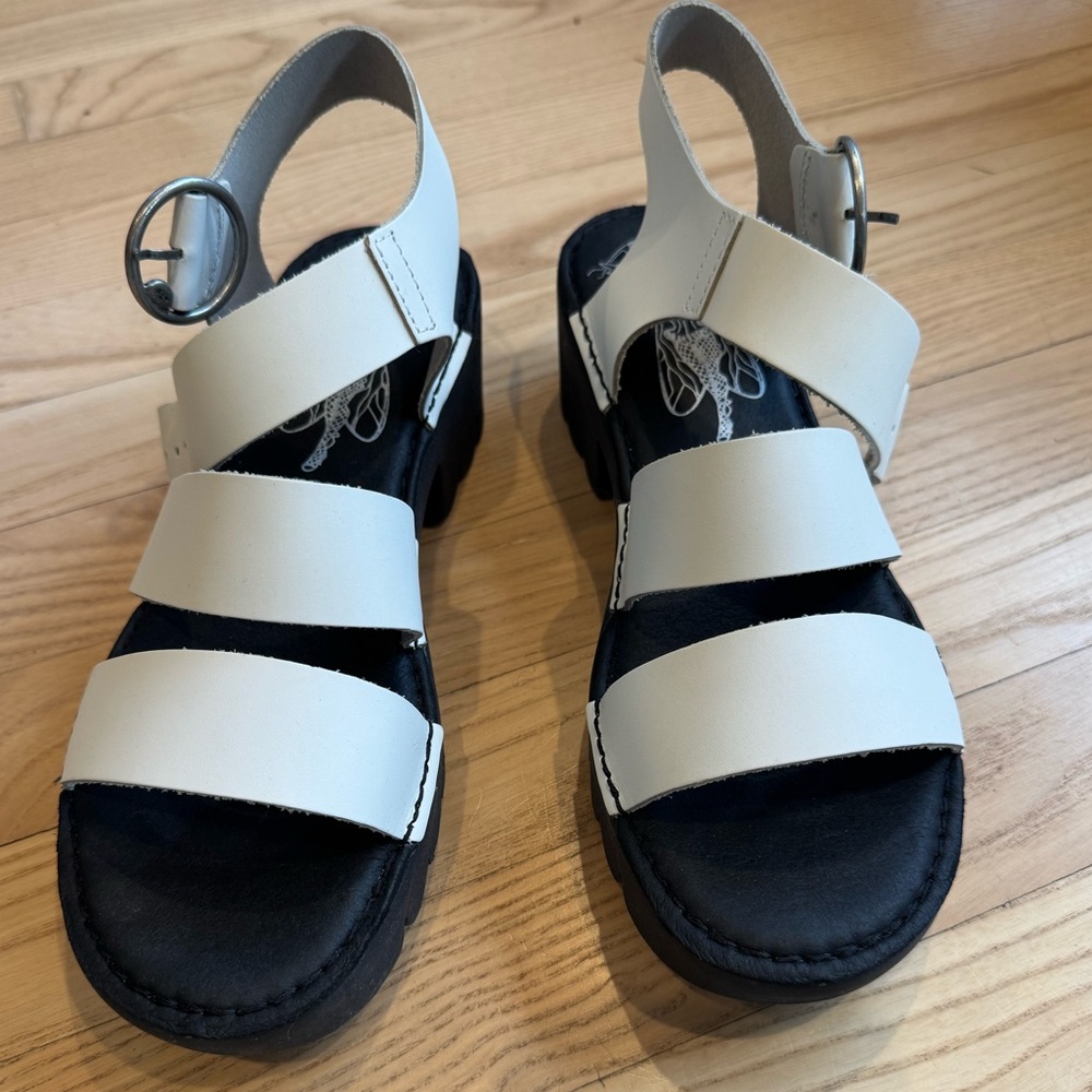 Fly London White Sandals with Black platform lug sole.  Brand new.